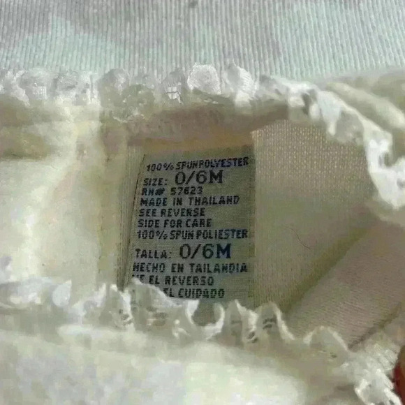 Little Lindsey Off-White top with embroidered red flowers, button back lace trim - Picture 6 of 6